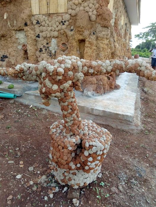 a sculpture at the akodi orisha titled gudugudu