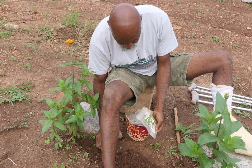 a picture of moyo okediji working at the akodi orisa