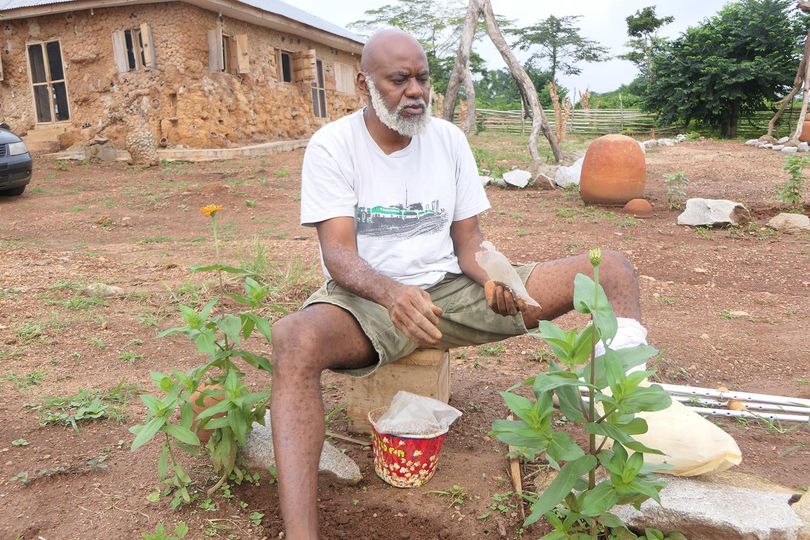 a picture of moyo okediji working at the akodi orisha