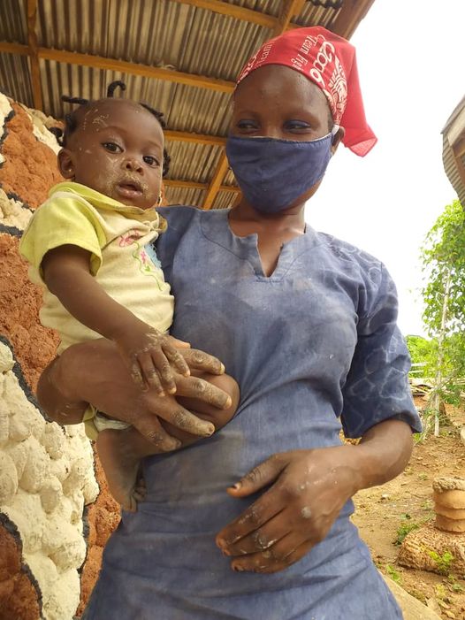 the picture shows the youngest artist at the Akodi Orisa Center in Ile Ife.