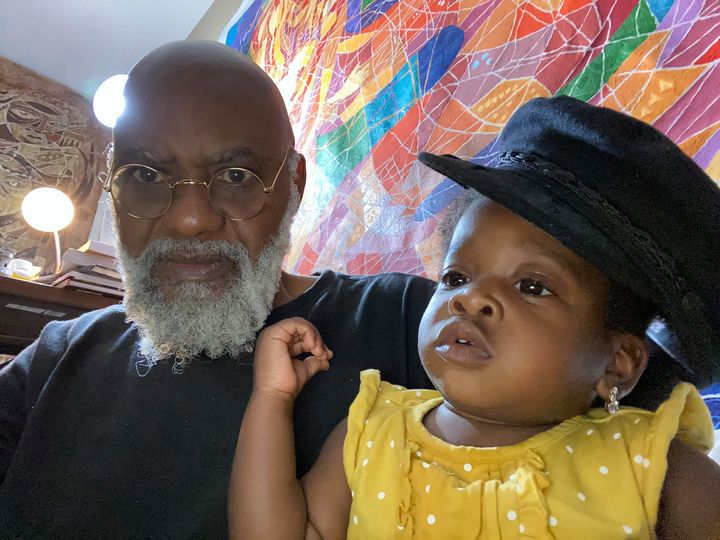 a picture showinf moyo okediji and his grand daughter