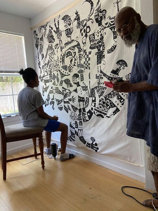 a post showing moyo okediji amd his apprentice working on a painting