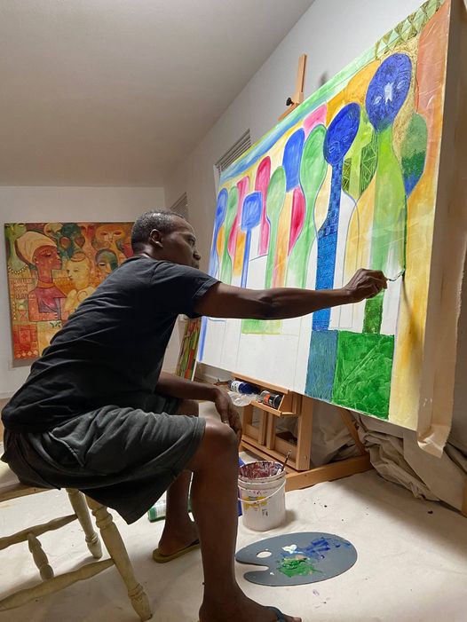 A picture of Moyo Okediji (Picture shows me painting jẹ́jẹ́ly in his studio