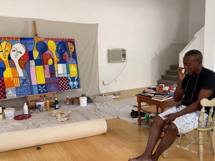 Adetola Wewe with moyo okediji in Austin Texas in moyos art gallery